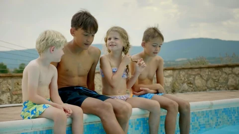 Stock Video Happy Children Talking Sitting On The Edge Of The Pool Animated Wallpaper - Free Live Wallpaper
