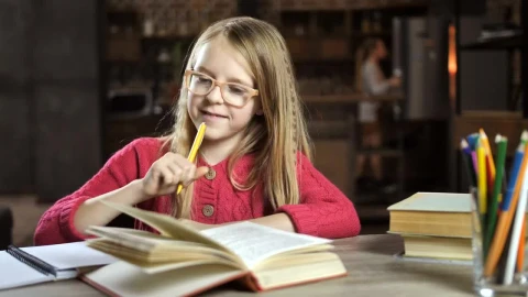 Stock Video Happy Child Doing Her Homework Animated Wallpaper - Free Live Wallpaper