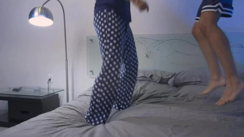 Stock Video Happily Couple Jumping On A Bed Animated Wallpaper - Free Live Wallpaper