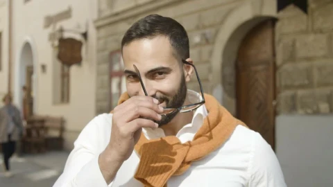 Stock Video Handsome Arab Man Takes Off Glasses And Smiles Animated Wallpaper - Free Live Wallpaper
