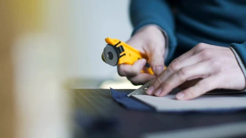 Stock Video Hands Using Tool To Cut Fabric Animated Wallpaper - Free Live Wallpaper