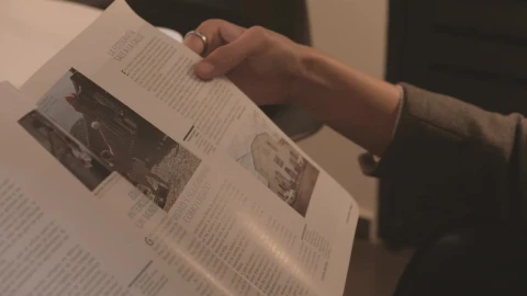 Stock Video Hands Of A Woman Slowly Leafing Through A Magazine Animated Wallpaper - Free Live Wallpaper