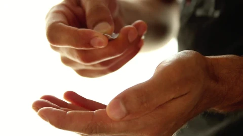 Stock Video Hands Of A Man Taking Pills From A Packaging Animated Wallpaper - Free Live Wallpaper
