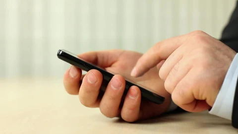 Stock Video Hands Of A Man In A Suit Using His Smartphone Animated Wallpaper - Free Live Wallpaper