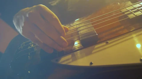 Stock Video Hands Of A Bass Player Playing A Song Animated Wallpaper - Free Live Wallpaper