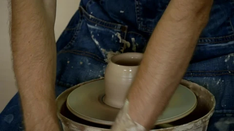 Stock Video Hands Molding Wet Clay Spinning Animated Wallpaper - Free Live Wallpaper
