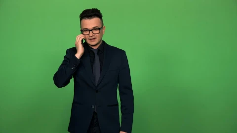 Stock Video Man In Suit And Glasses Answering A Phone Call Animated Wallpaper - Free Live Wallpaper