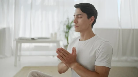 Stock Video Man In Peaceful Mind Meditation At Home Animated Wallpaper - Free Live Wallpaper