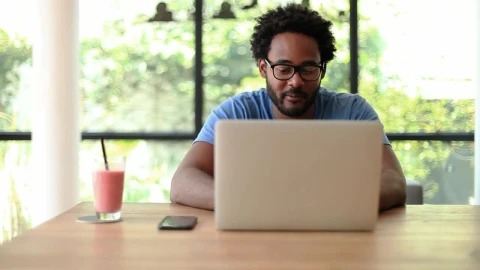 Stock Video Man In Front Of Computer Working From Home Animated Wallpaper - Free Live Wallpaper