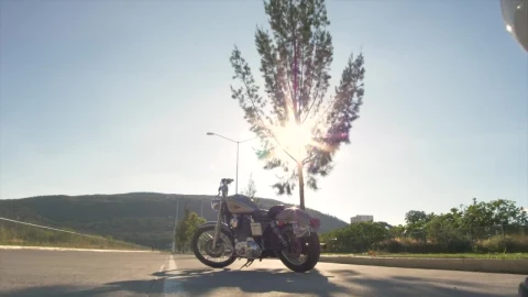 Stock Video Man In Biker Gear Approaches Stationary Motorcycle Animated Wallpaper - Free Live Wallpaper