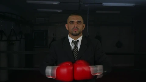 Stock Video Man In A Suit Wearing Red Boxing Gloves Animated Wallpaper - Free Live Wallpaper