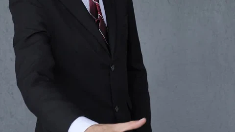 Stock Video Man In A Suit Giving A Firm Handshake Animated Wallpaper - Free Live Wallpaper