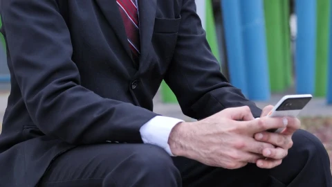 Stock Video Man In A Suit And A Mask Checks His Cell Animated Wallpaper - Free Live Wallpaper