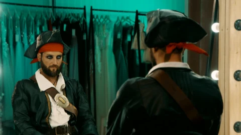Stock Video Man In A Costume In Front Of A Mirror Animated Wallpaper - Free Live Wallpaper