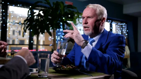 Stock Video Man In A Blue Suit Talking Over Dinner Animated Wallpaper - Free Live Wallpaper