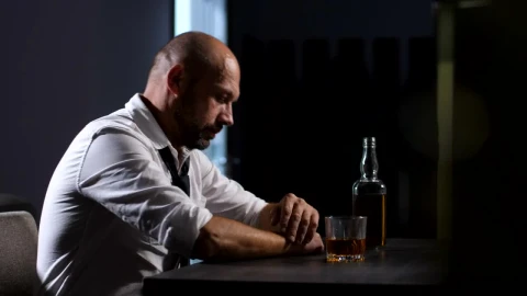 Stock Video Man Holding His Head At A Bar Animated Wallpaper - Free Live Wallpaper
