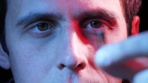 Stock Video Man Holding A Small Microchip Animated Wallpaper - Free Live Wallpaper