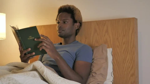 Stock Video Man Goes To Sleep After Reading Animated Wallpaper - Free Live Wallpaper
