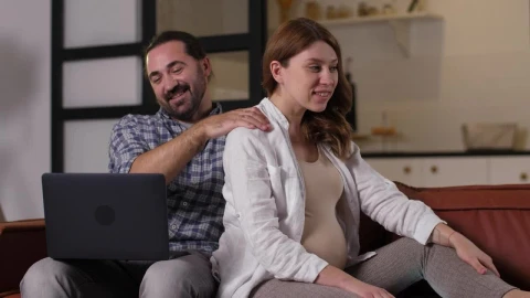 Stock Video Man Giving A Massage To His Pregnant Wife Animated Wallpaper - Free Live Wallpaper
