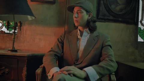 Stock Video Man From A Bygone Era Sitting On A Sofa Animated Wallpaper - Free Live Wallpaper