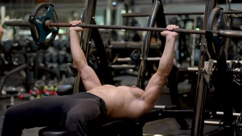 Stock Video Man Exercising With A Dumbbell In A Gym Animated Wallpaper - Free Live Wallpaper