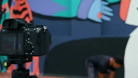 Stock Video Man Exercising While Videotaping Animated Wallpaper - Free Live Wallpaper