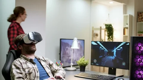 Stock Video Man Enjoys Virtual Gaming In Home Office Animated Wallpaper - Free Live Wallpaper