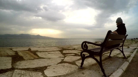 Stock Video Man Enjoying The Peace Of Seeing The Sea Animated Wallpaper - Free Live Wallpaper
