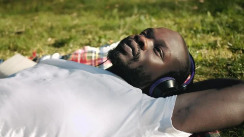 Stock Video Man Enjoying Music In The Park Animated Wallpaper - Free Live Wallpaper
