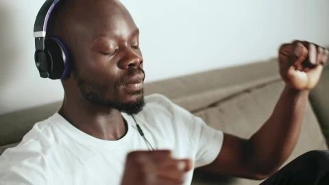 Stock Video Man Enjoying His Favorite Song Animated Wallpaper - Free Live Wallpaper
