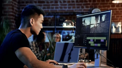Stock Video Man Editing Video In The Computer Animated Wallpaper - Free Live Wallpaper