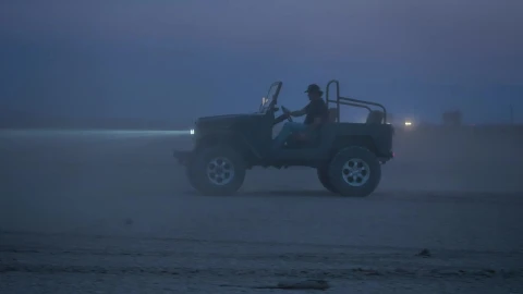 Stock Video Man Driving A Jeep In The Desert At Night Animated Wallpaper - Free Live Wallpaper