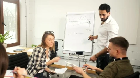 Stock Video Man Draws Strategy For Digital Marketing Team Animated Wallpaper - Free Live Wallpaper