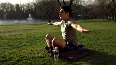 Stock Video Man Doing Yoga By A City Lake Animated Wallpaper - Free Live Wallpaper
