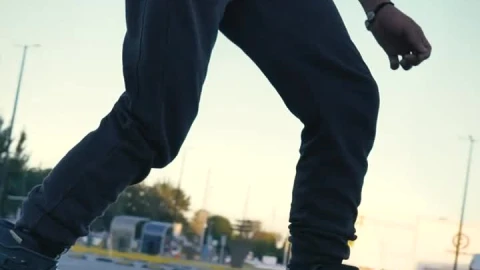 Stock Video Man Doing Tricks With Roller Skates In A Parking Lot Animated Wallpaper - Free Live Wallpaper