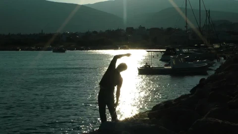 Stock Video Man Doing Stretching In Port At Sunrise Animated Wallpaper - Free Live Wallpaper