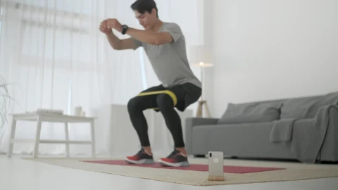 Stock Video Man Doing Squats At Home Animated Wallpaper - Free Live Wallpaper