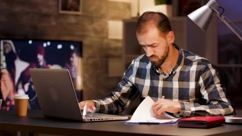Stock Video Man Doing Research On Laptop From Home Office Animated Wallpaper - Free Live Wallpaper