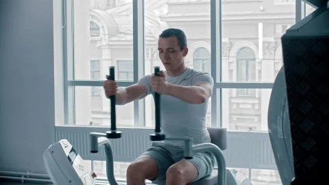 Stock Video Man Doing Chest Exercise At A White Gym Animated Wallpaper - Free Live Wallpaper