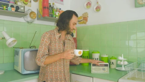Stock Video Man Dancing While Drinking Coffee In An S Kitchen Animated Wallpaper - Free Live Wallpaper