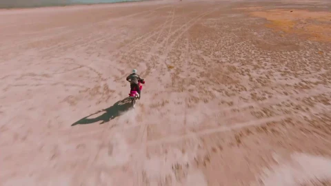 Stock Video Man Crossing The Desert On His Motorcycle Animated Wallpaper - Free Live Wallpaper