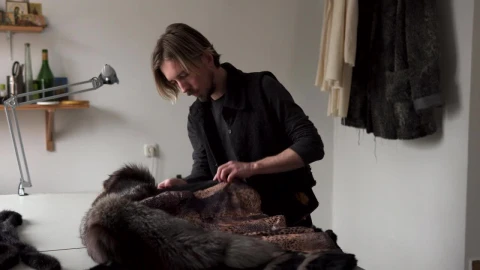 Stock Video Man Creating A Fur Coat Animated Wallpaper - Free Live Wallpaper