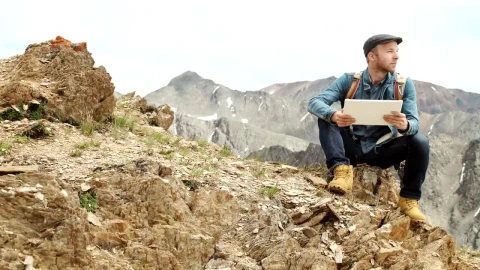 Stock Video Man Connected To A Network On A Mountain Animated Wallpaper - Free Live Wallpaper