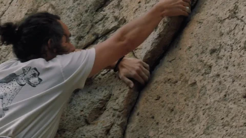 Stock Video Man Climbing A Rocky Mountain Animated Wallpaper - Free Live Wallpaper
