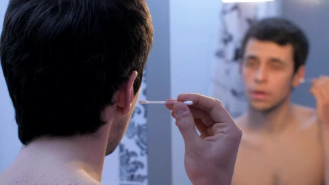 Stock Video Man Cleaning His Ears In The Bathroom Mirror Animated Wallpaper - Free Live Wallpaper