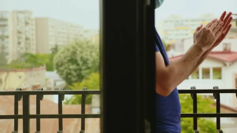 Stock Video Man Clapping While Wearing A Mask Animated Wallpaper - Free Live Wallpaper