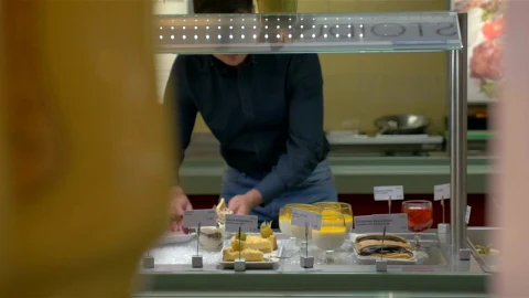 Stock Video Man Choosing Items From A Buffet Animated Wallpaper - Free Live Wallpaper
