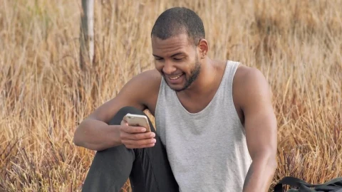 Stock Video Man Checks His Smartphone After Training Animated Wallpaper - Free Live Wallpaper