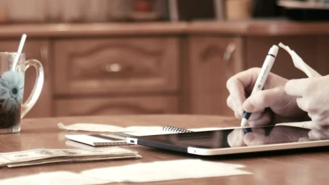 Stock Video Man Checking Bills And Doing Budgets Animated Wallpaper - Free Live Wallpaper