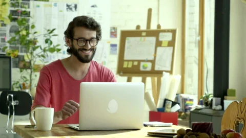 Stock Video Man Celebrating In Front Of The Computer Animated Wallpaper - Free Live Wallpaper